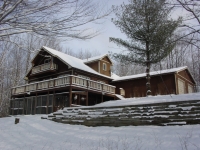 Southwest view of home during the winter.